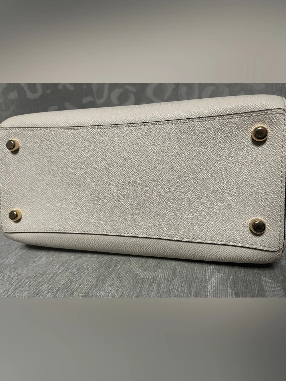 Coach Rowan medium in cream with gold hardware.